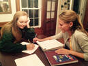 An NLU tutor working with a student on Algebra  in their home in Westwood.